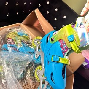 Vibrant Blue and Green Kids Roller Skates